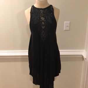 Black tunic with gold beads